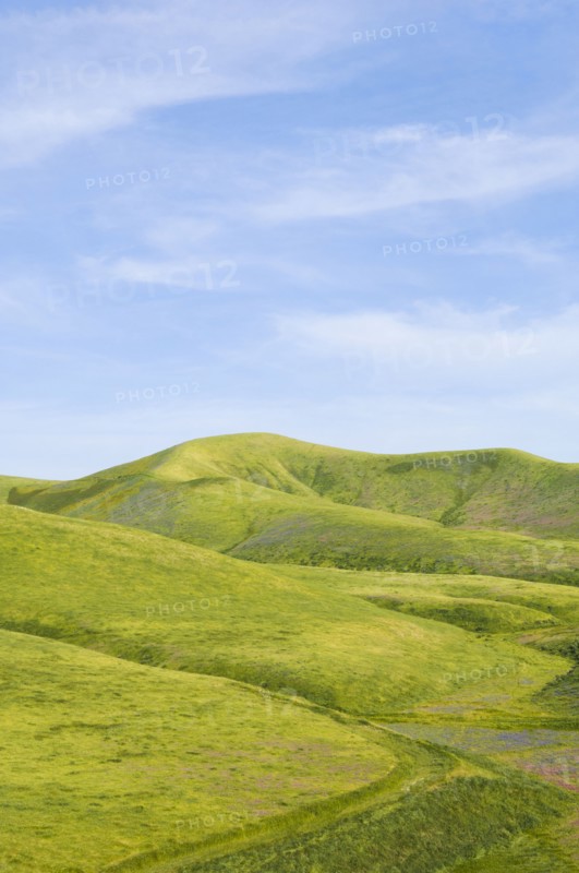 Hills and blue sky in rolling landscape