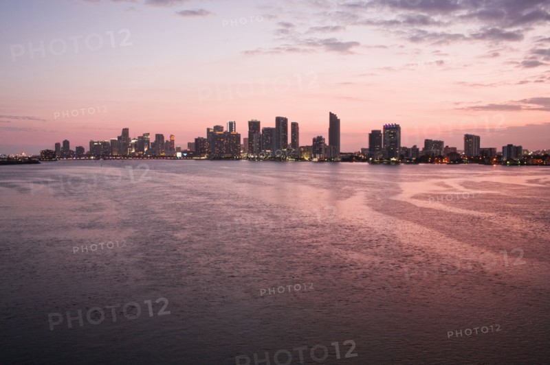 Miami city skyline and harbor at sunset