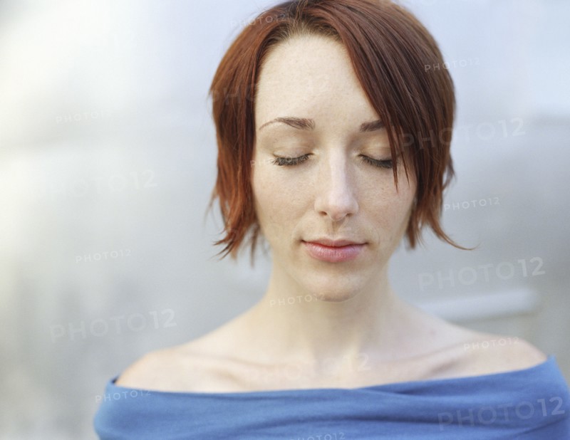 Caucasian woman with eyes closed