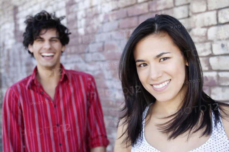 Smiling couple hugging