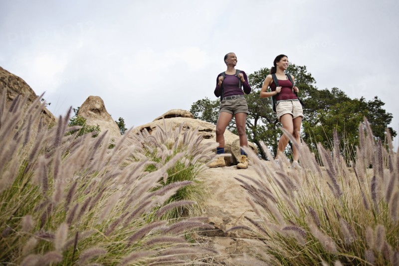 Mother and daughter hiking together