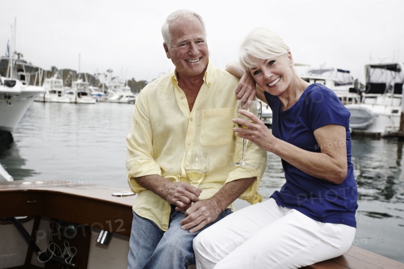 Couple drinking wine on boat