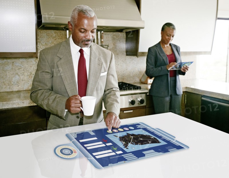 Businessman using computer in table