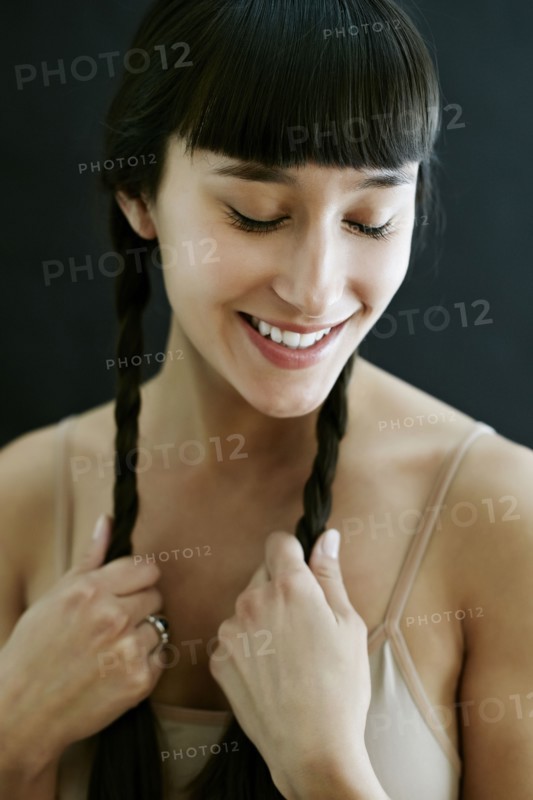 Mixed race woman smiling
