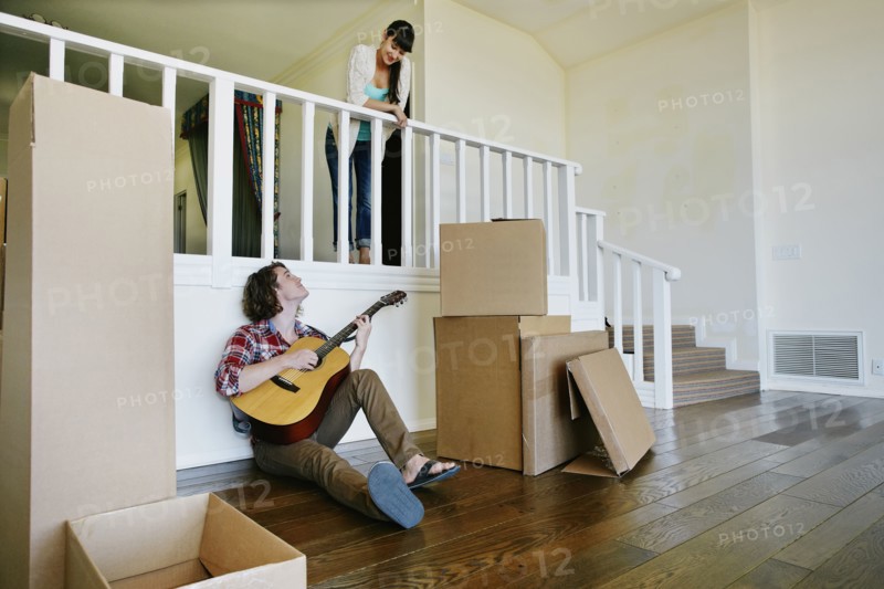 Couple relaxing in new home
