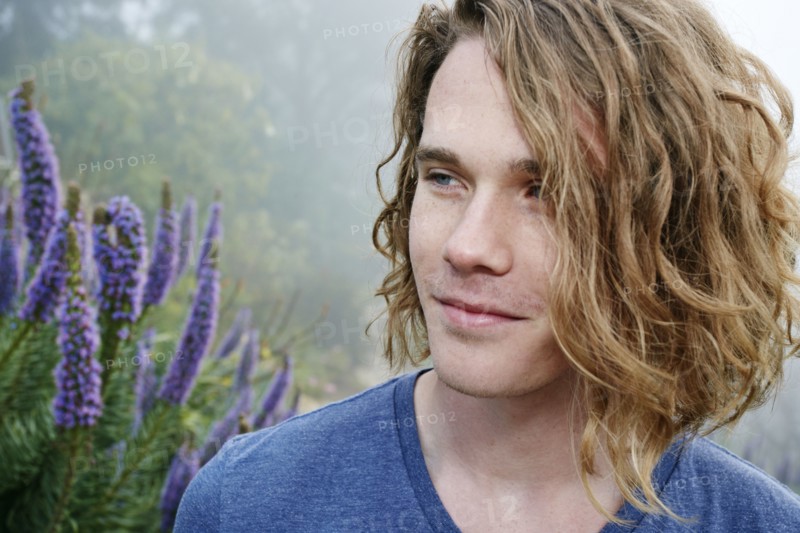 Caucasian man standing outdoors