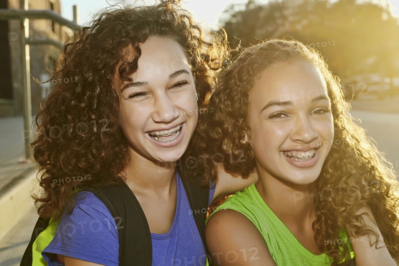 Mixed race girls smiling