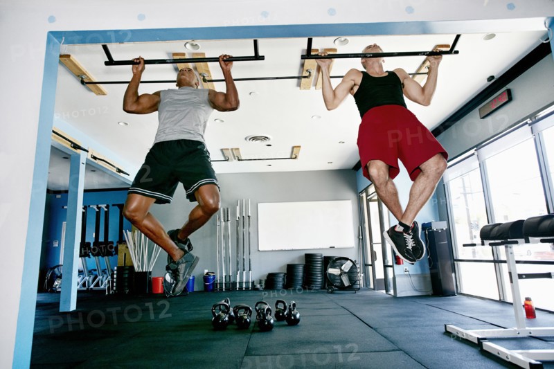 Men working out in gym