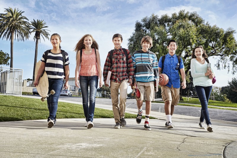 Teenagers walking to school