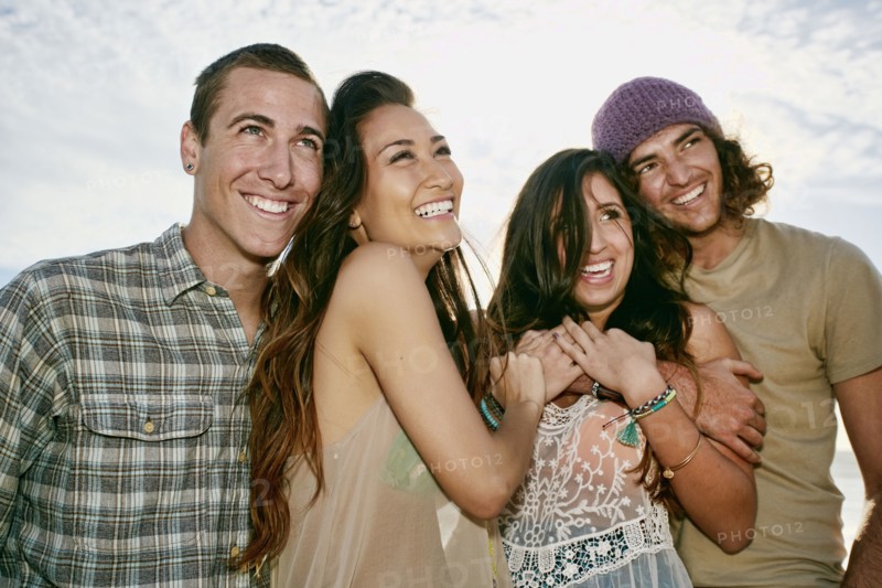 Couples smiling together outdoors