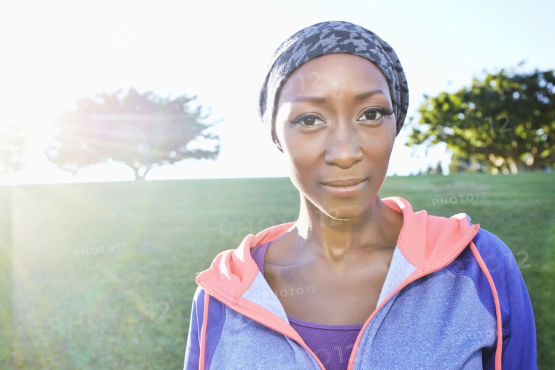 African American woman smiling in park