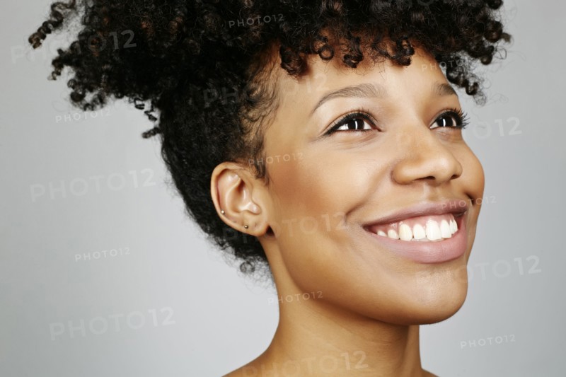 Close up of smiling face of mixed race woman
