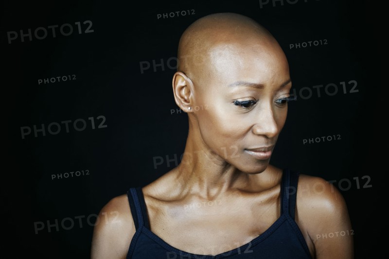 Close up of face African American woman looking down