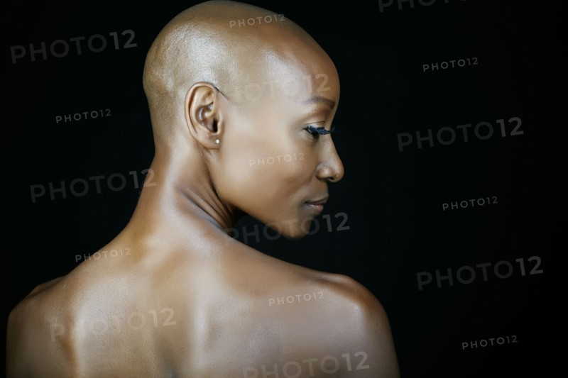 African American woman looking over her shoulder
