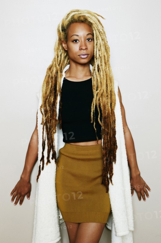 Stylish Black woman with dreadlocks