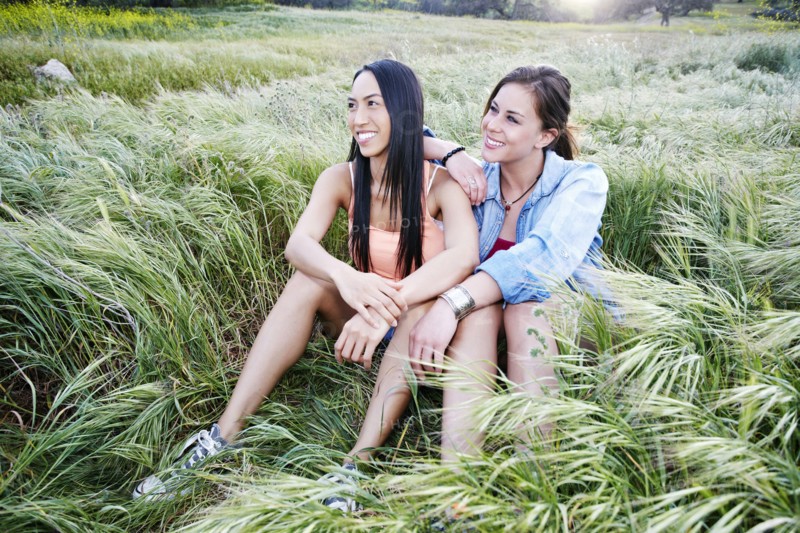Women sitting in field