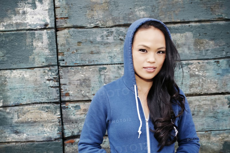 Asian woman wearing hoodie