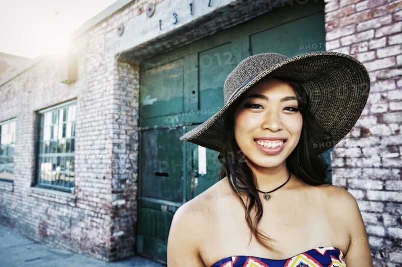Japanese woman smiling outdoors