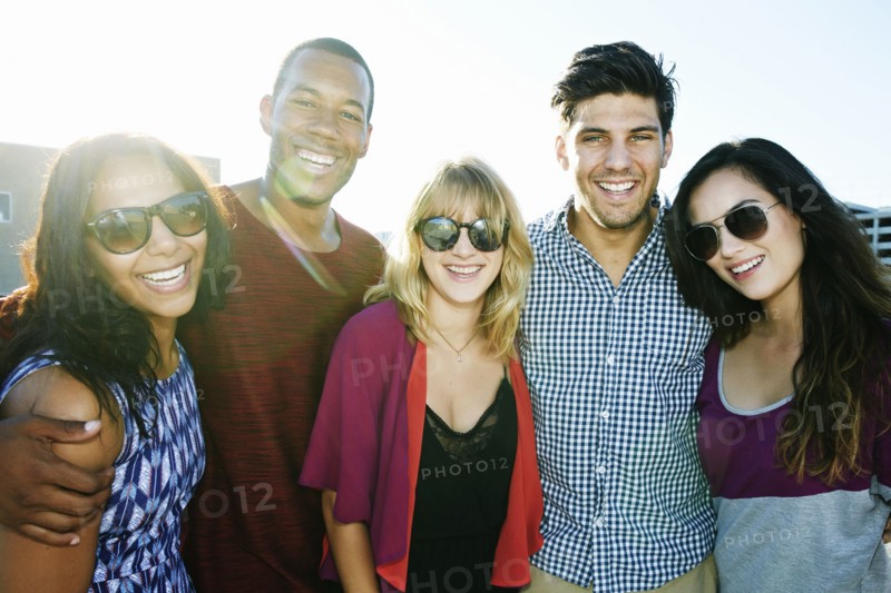 Friends smiling outdoors