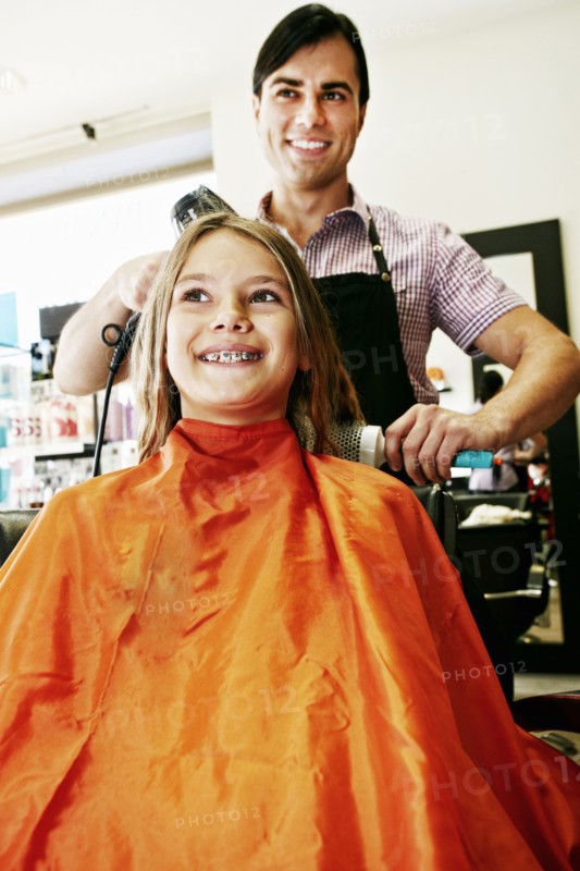 Hairdresser and customer in hair salon