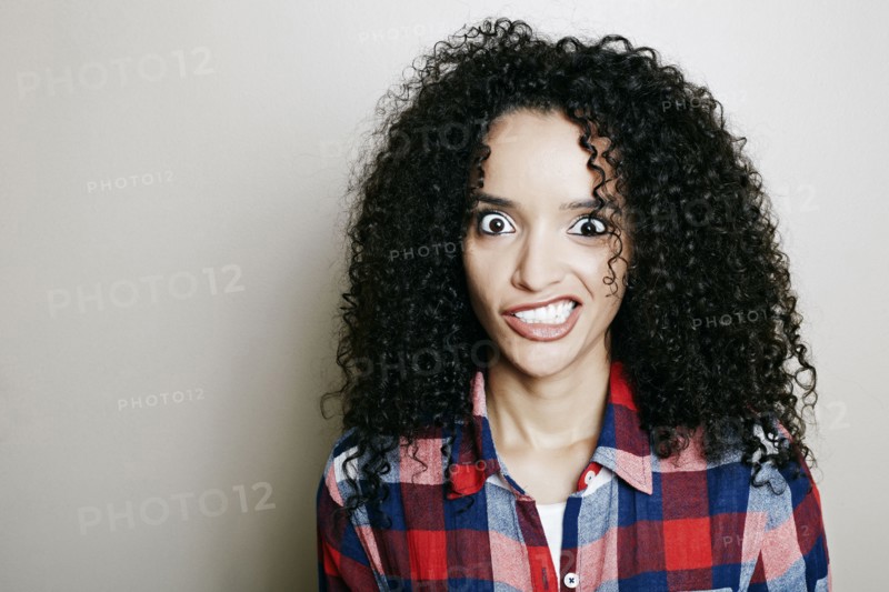 Hispanic woman making a face