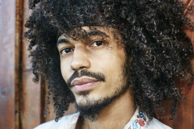 Portrait of serious Mixed Race man