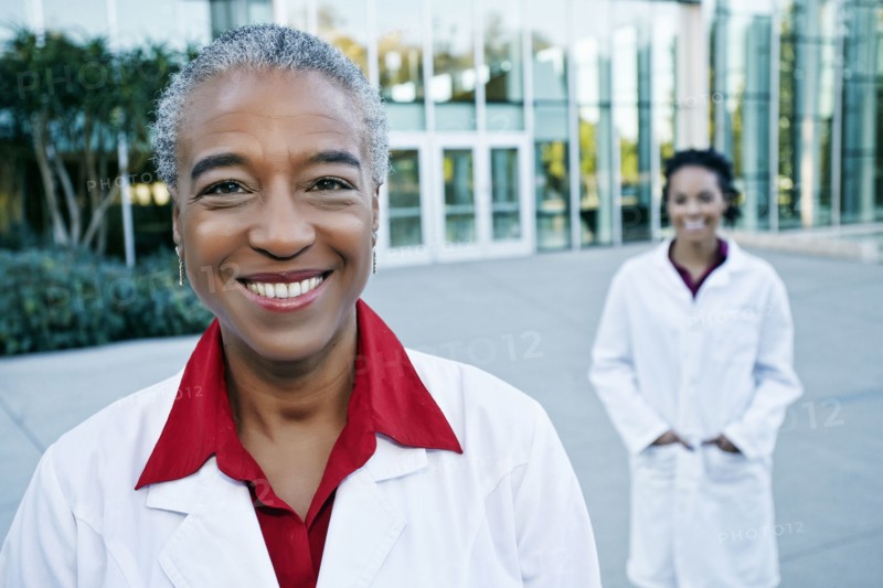 Portrait of smiling doctor outdoors at hospital