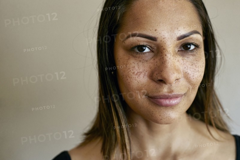 Close up of smiling mixed race woman
