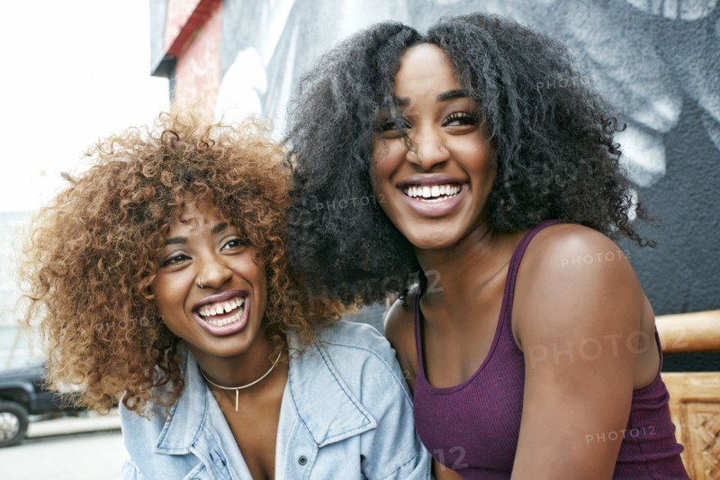 Women laughing outdoors
