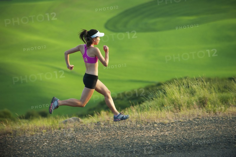 Japanese runner running in countryside