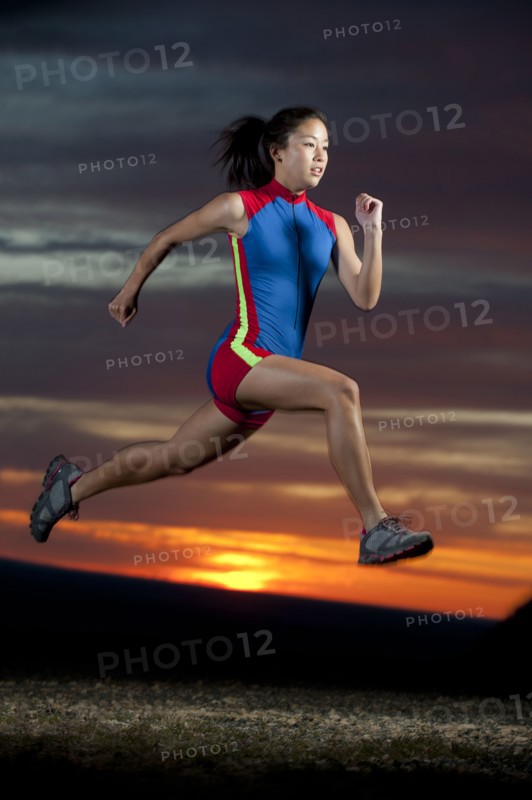 Japanese runner running at sunset