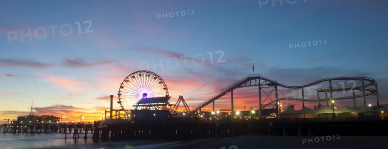Amusement park on waterfront at night