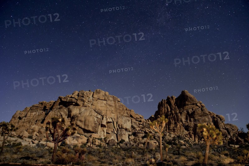 Stars in sky over desert