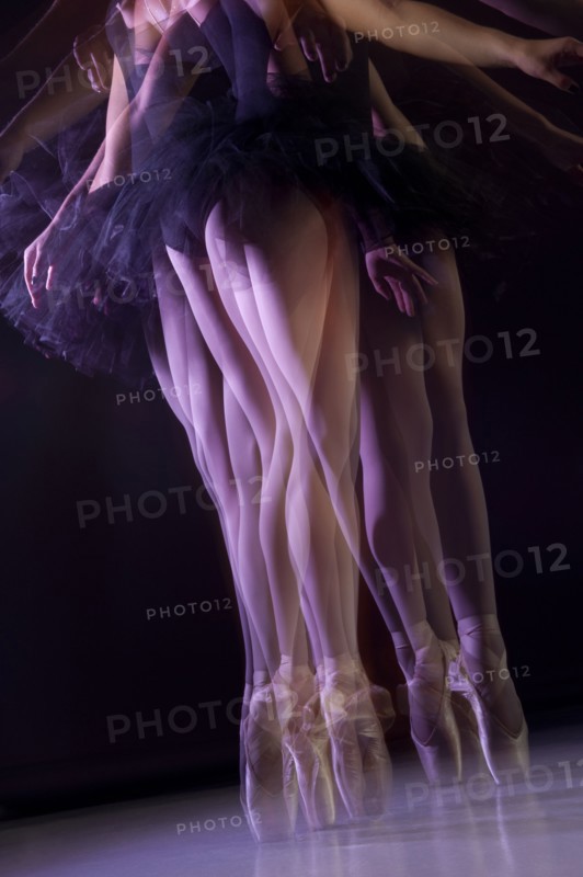Caucasian ballerina dancing on stage