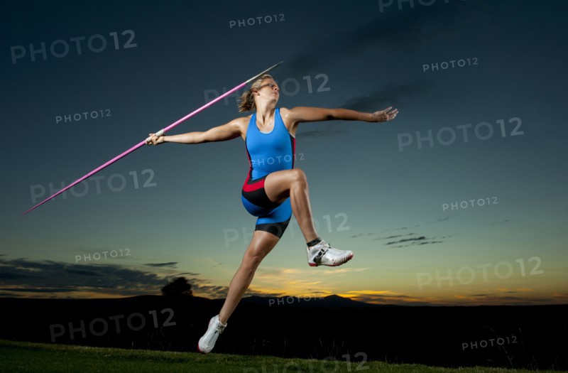 Caucasian athlete aiming javelin
