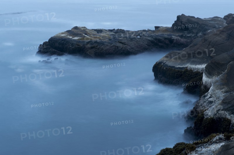 Aerial view of foggy coastline