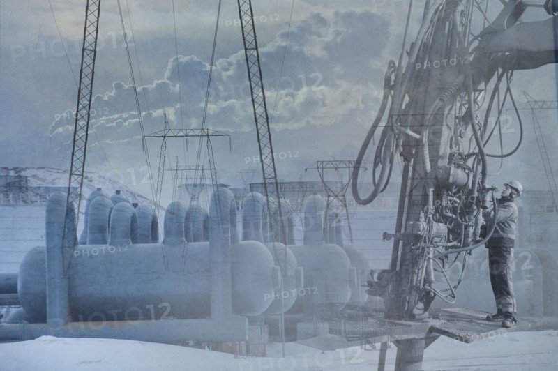 Double exposure of power plant and landscape