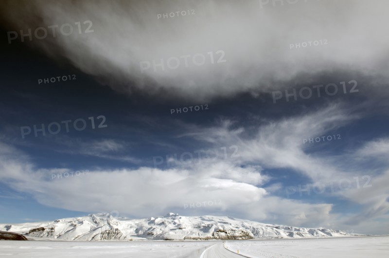 Snow covered mountain in rural landscape