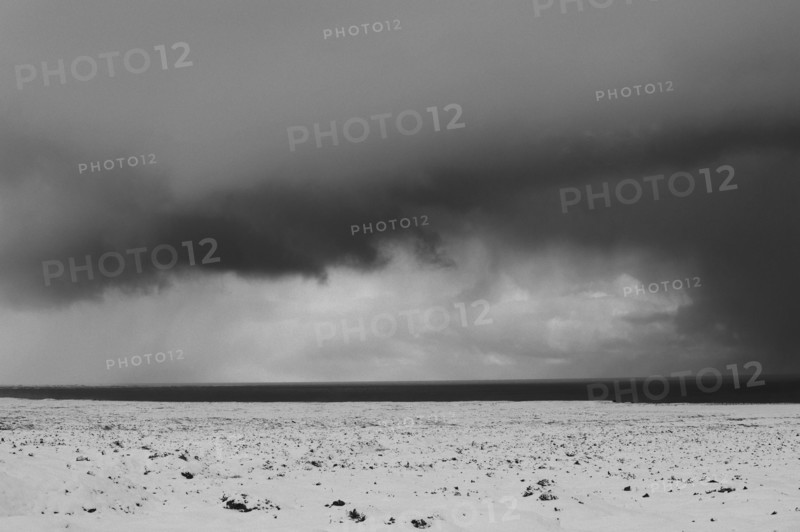 Cloudy sky over arctic landscape