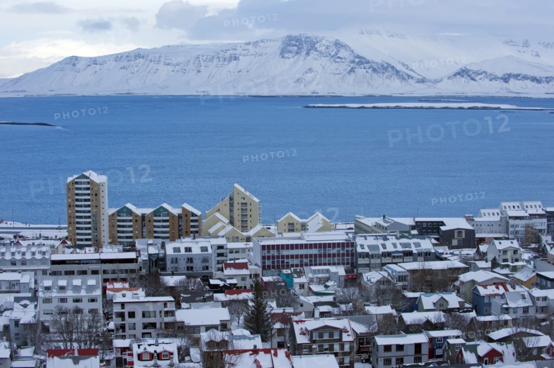 Snowy city and lake in arctic landscape