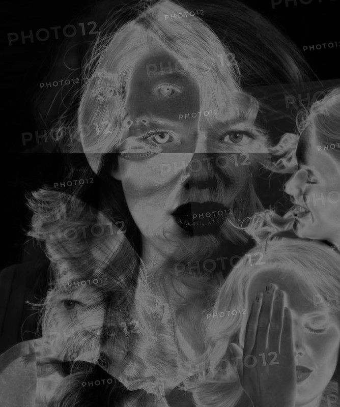 Multiple exposures of face of Caucasian woman