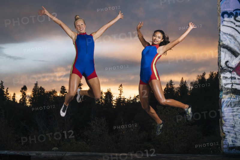 Runners jumping for joy