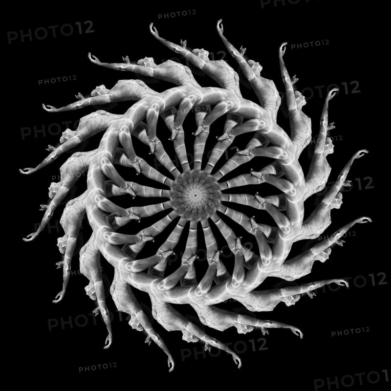Multiple exposure of Caucasian woman swimming in spiral