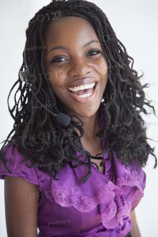 Black businesswoman talking on headset