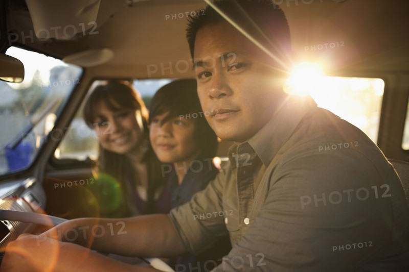 Family riding in van together