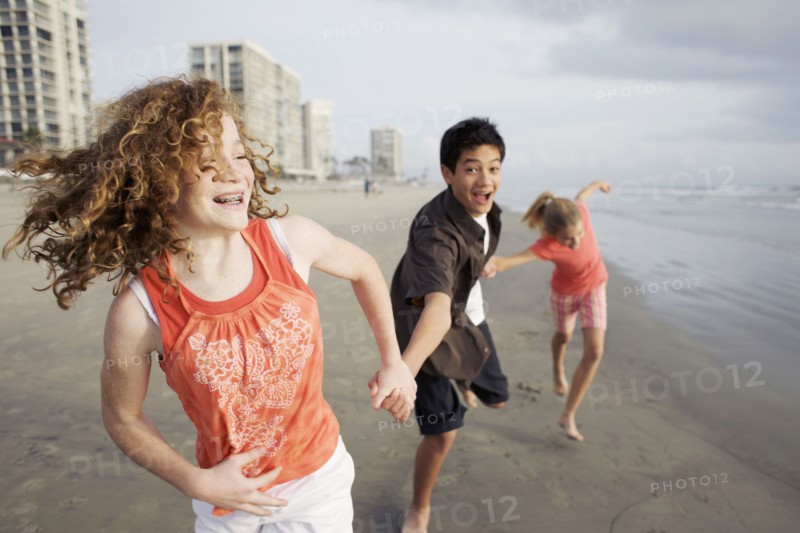 Friends playing on beach