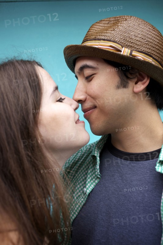 Happy couple smiling at one another