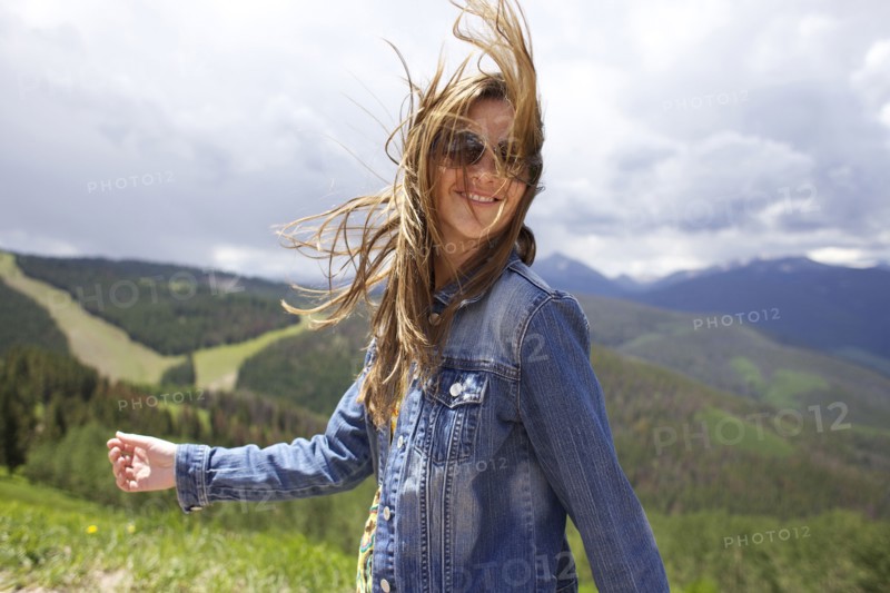 Smiling woman walking outdoors