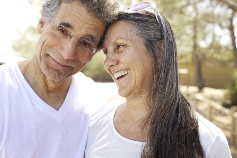 Older Caucasian couple smiling