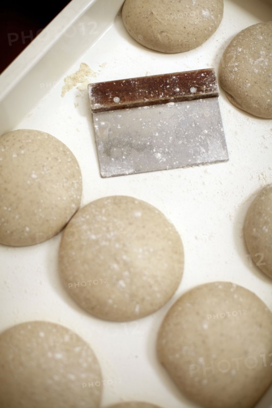 Raw bread dough on tray